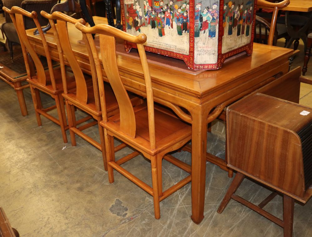 A Chinese dining table and six chairs, table W.216cm, D.86cm, H.84cm